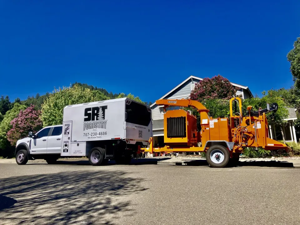 SRT Forestry truck and chipper at a tree-work site
